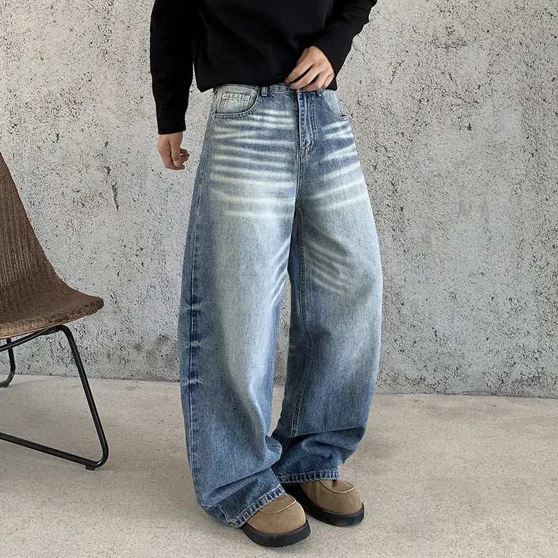 Blue Men's Baggy Jeans with High-Waisted Relaxed Fit & Whisker Fading - Front Closeup Fade