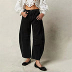 Black Women's High-Waisted Barrel Leg Jeans — Dot Denim Curved-Seam Relaxed - Front Closeup Waist