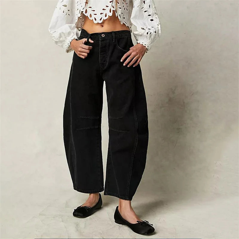 Black Women's High-Waisted Barrel Leg Jeans — Dot Denim Curved-Seam Relaxed - Front Closeup Waist