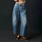 Blue Women's High-Waisted Barrel Leg Jeans — Dot Denim Curved-Seam Relaxed - Front Dark Background