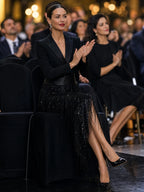 Black Women's Sequin Midi Dress with Satin-Belted Blazer Bodice & Fringe Skirt - Seated Pose