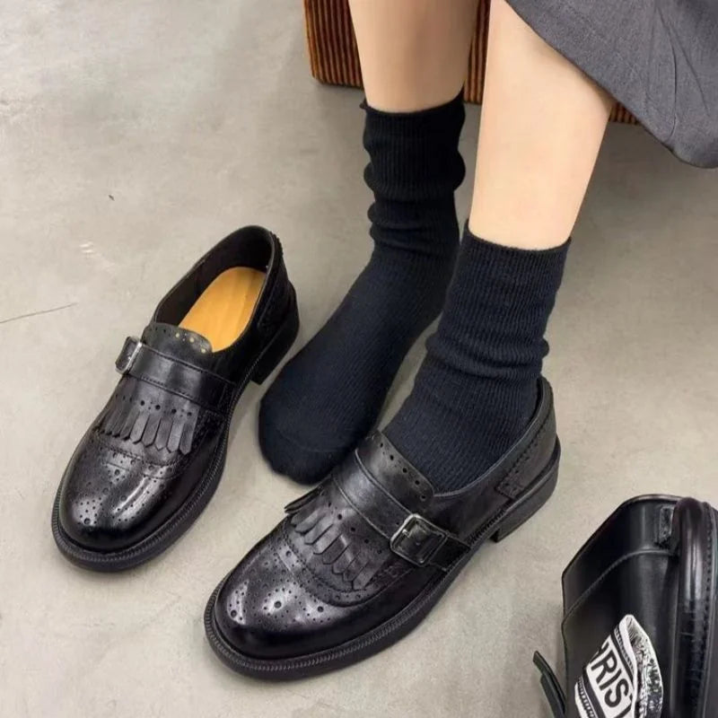Black single strap with buckle Women's Leather Brogue Loafers with Fringed Cap & Adjustable Buckle - Close Up Top View