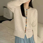 Beige Women's Rainbow Button Knit Cardigan — Allie Ribbed-Knit Crew Neck Relaxed - Front Bed Lifestyle