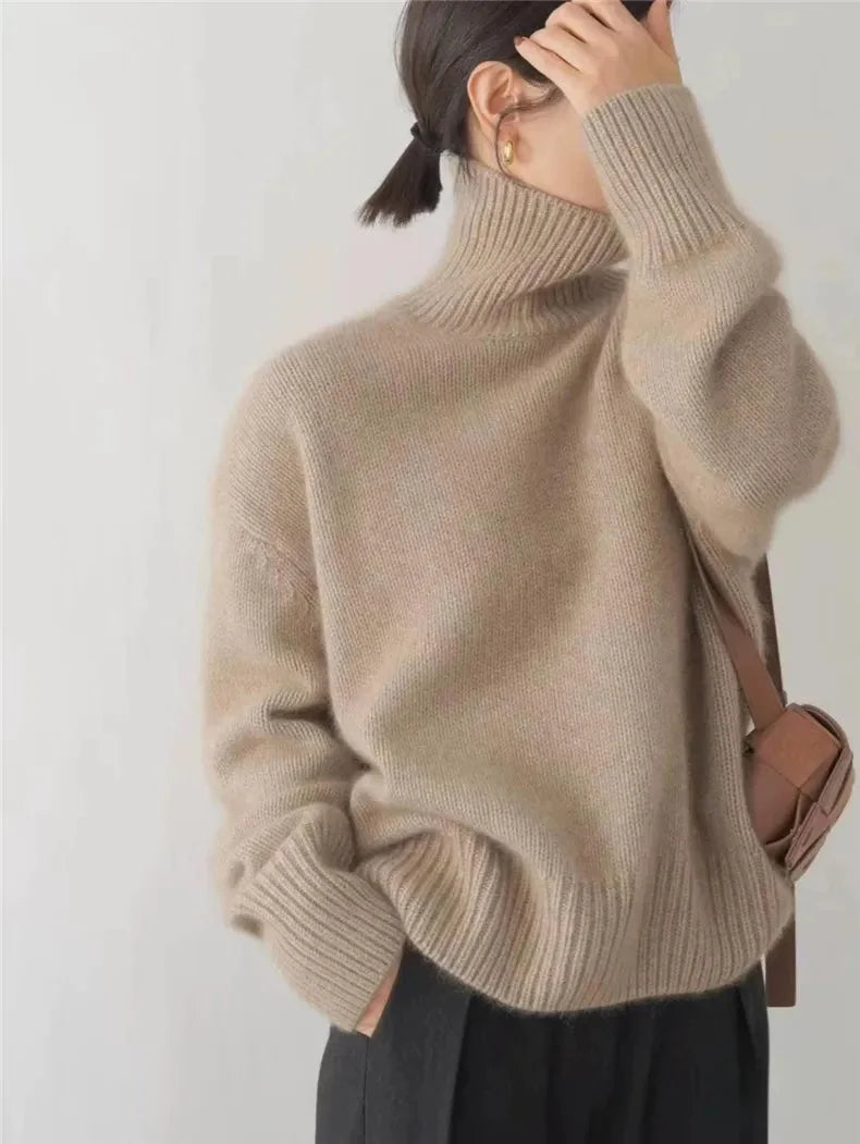 Khaki Women's Cashmere Turtleneck Sweater with Ribbed Cuffs & Relaxed Fit - Back Hair Pose
