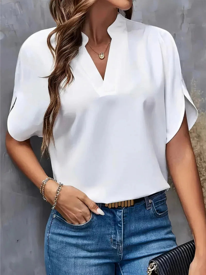 White Women's Casual Blouse with Split Flutter Sleeves & Notch Neckline — Darcy - Outdoor Pose