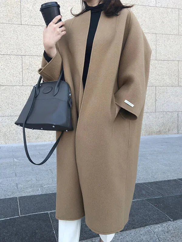 Women's Long Wool Coat with Collarless Neckline & Relaxed Fit - Side Detail