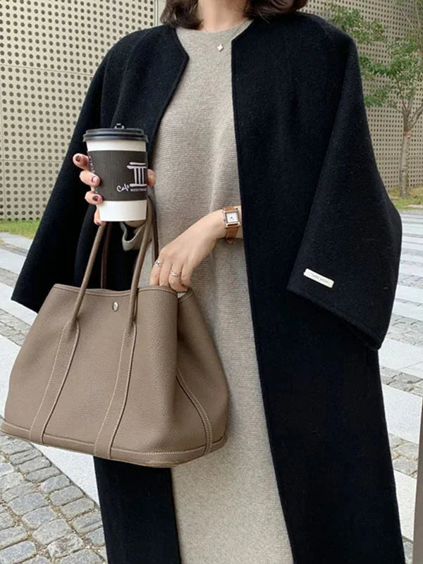 Women's Long Wool Coat with Collarless Neckline & Relaxed Fit - Close Up Bag