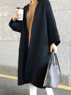 Women's Long Wool Coat with Collarless Neckline & Relaxed Fit - Front Closeup