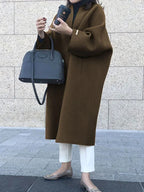 Brown Women's Long Wool Coat with Collarless Neckline & Relaxed Fit - Side Pose
