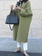 Green Women's Long Wool Coat with Collarless Neckline & Relaxed Fit - Front Pose