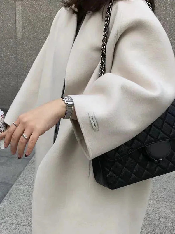 Women's Long Wool Coat with Collarless Neckline & Relaxed Fit - Close Up Detail