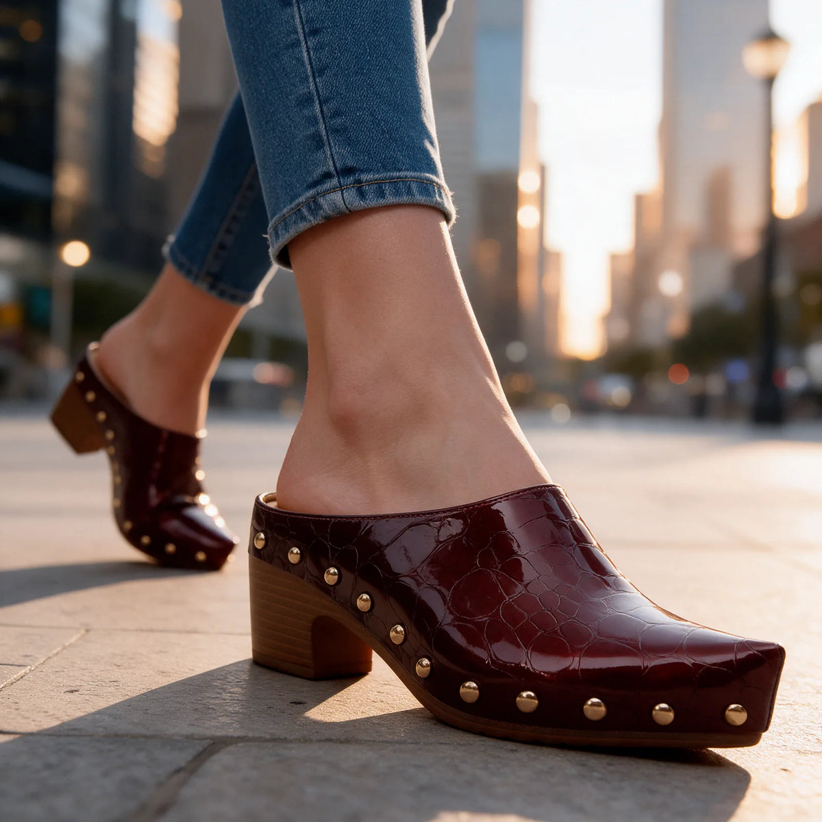 Women's Studded Mules with Croc-Embossed Pointed Toe & Block Heel - Model Walking Sunset