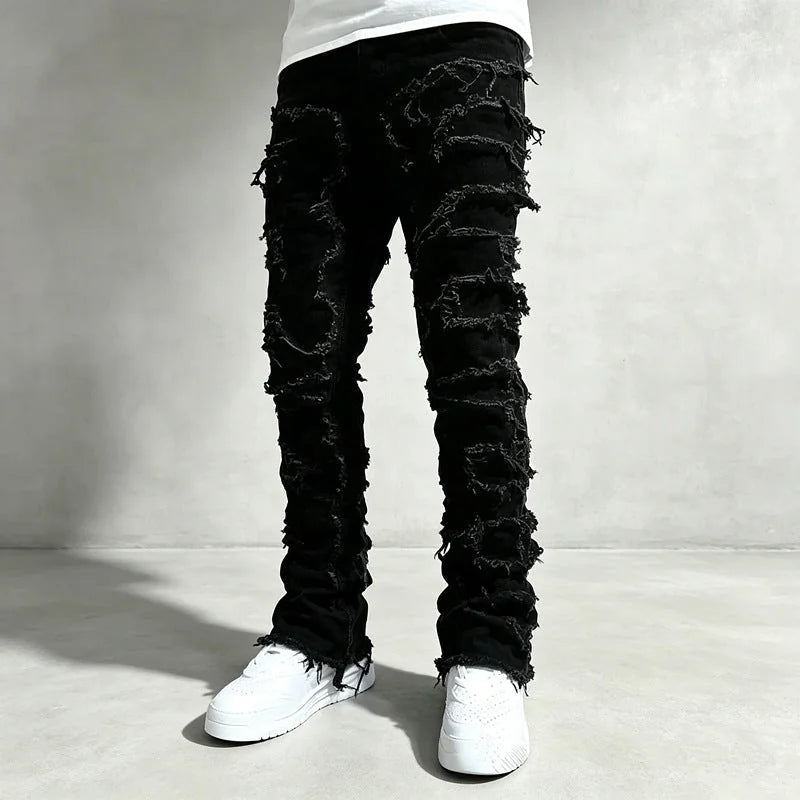 Black Men's Ripped Skinny Jeans with Stretch Denim & Stacked Fit - Front Detail