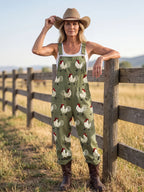 Military Green Women's Embroidered Rooster Jumpsuits — Phoebe Relaxed-Fit Cotton Overalls - Front Fence Pose
