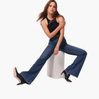 Blue Women's High-Waisted Bootcut Jeans — Sadie Everyday Flared Five-Pocket - Seated Side Pose