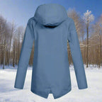 Blue Women's Rain Jacket With Hood — Lena Lightweight Waterproof Zip-Pocket - Back View Snowy