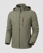 Olive Green Men's Softshell Jacket with Hood, Zip Pockets & Adjustable Cuffs - Flat Lay
