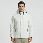 White Men's Hooded Waterproof Rain Jacket — Elle Nylon Zip-Pocket Adjustable Cuffs - Front Pose Light