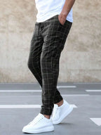 Men's Plaid Trousers with Drawstring Waist & Tapered Cuffed Fit - Standing Pose