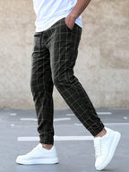 Men's Plaid Trousers with Drawstring Waist & Tapered Cuffed Fit - Walking Detail