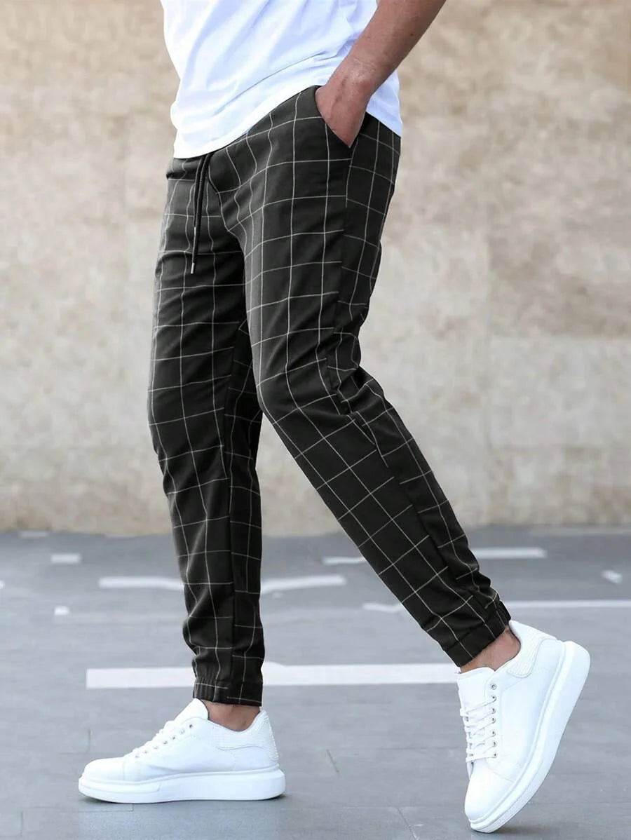 Men's Plaid Trousers with Drawstring Waist & Tapered Cuffed Fit - Walking Detail