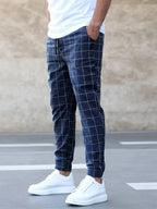 Dark Blue Men's Plaid Trousers with Drawstring Waist & Tapered Cuffed Fit - Standing Front