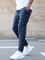 Men's Plaid Trousers with Drawstring Waist & Tapered Cuffed Fit - Walking Motion