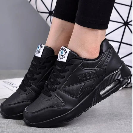 Black Women's Lace-Up Athletic Sneakers — Diana Faux Leather Cushioned Sole - Front Worn Closeup