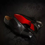 Black Men's Leather Oxford Shoes — Hayden Tailored Cap-Toe Lace-Up - Dark Background Pose