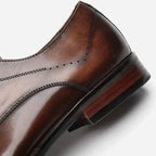 Brown Men's Handcrafted Cap-Toe Oxford Shoes — Thomas Leather Brogue Lace-Up - Heel Detail Closeup