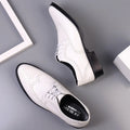 White Men's Leather Oxford Shoes — Ronan Cushioned Wingtip Brogue - Flat Lay Pair
