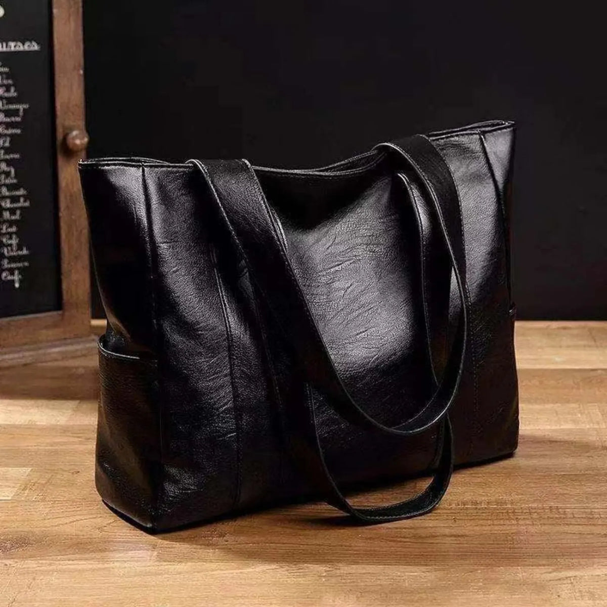 Black Women's Leather Shoulder Bag with Spacious Side Pockets