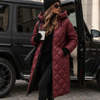 Red Women's Long Quilted Puffer Coat with Hood & Tailored Fit - Front Pose Street