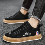 Black Women's Low Top Sneakers with Lace-Up Closure & Cushioned Comfort - Side Worn Closeup