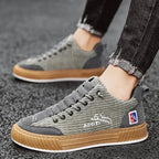 Grey Women's Low Top Sneakers with Lace-Up Closure & Cushioned Comfort - Side Walking