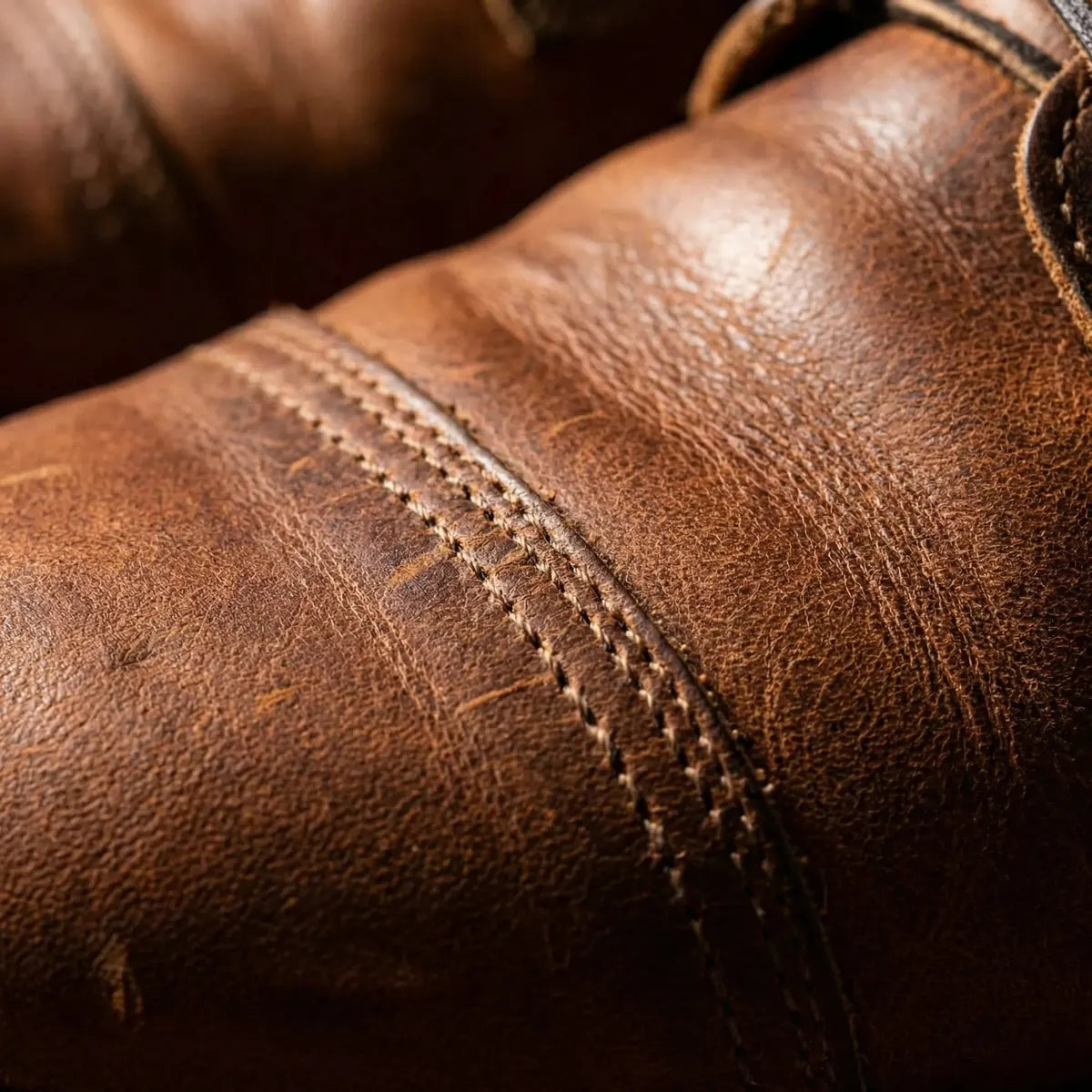 Brown Men's Lace-Up Ankle Boots with Cap Toe & Stitched Detailing - Close Up Stitching