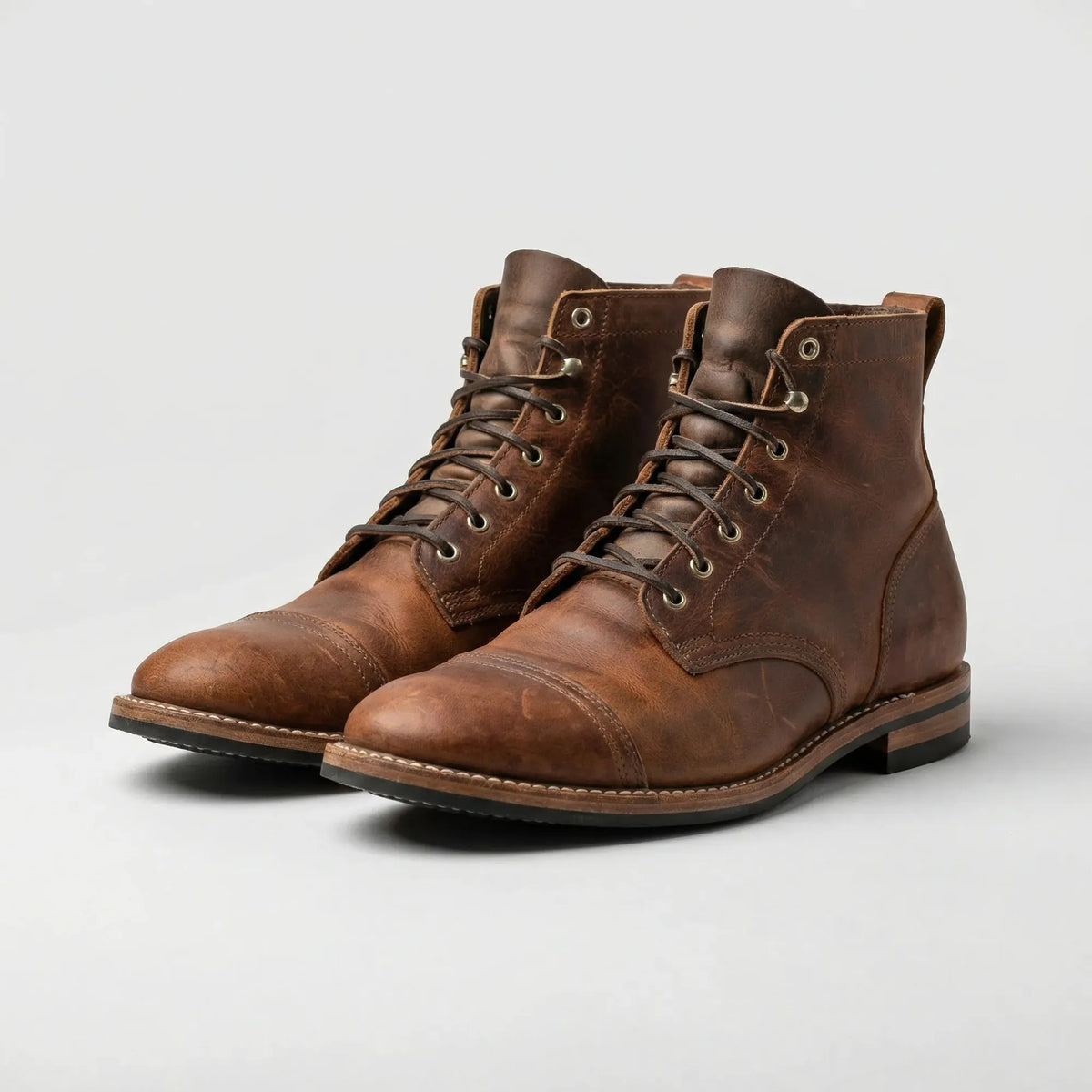 Brown Men's Lace-Up Ankle Boots with Cap Toe & Stitched Detailing - Studio Side Angle