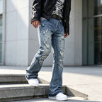 Blue Men's Ripped Slim-Fit Flared Jeans with Frayed Hem - Front Angle Steps