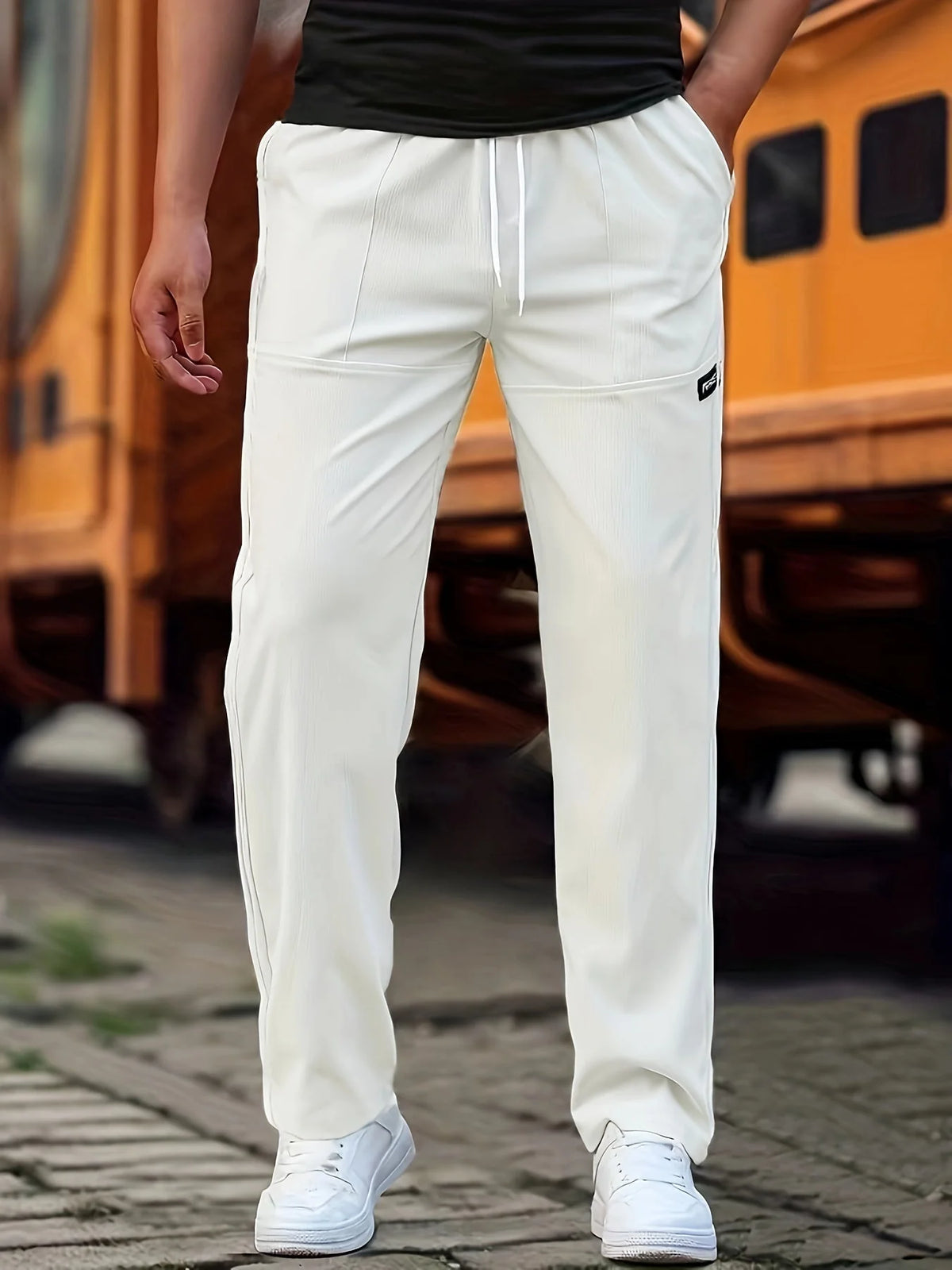 White Men's Sport Pants with Drawstring Waist & Side Pockets - Front Standing