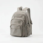 Grey Women's Everyday Multi Pocket School Backpack with Adjustable Straps — Beatrix - Brown Studio Front Angle