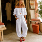 White Women's Off Shoulder Jumpsuit with Linen-Blend Puff Sleeves & Drawstring Waist — Lyra - Front Full Indoor