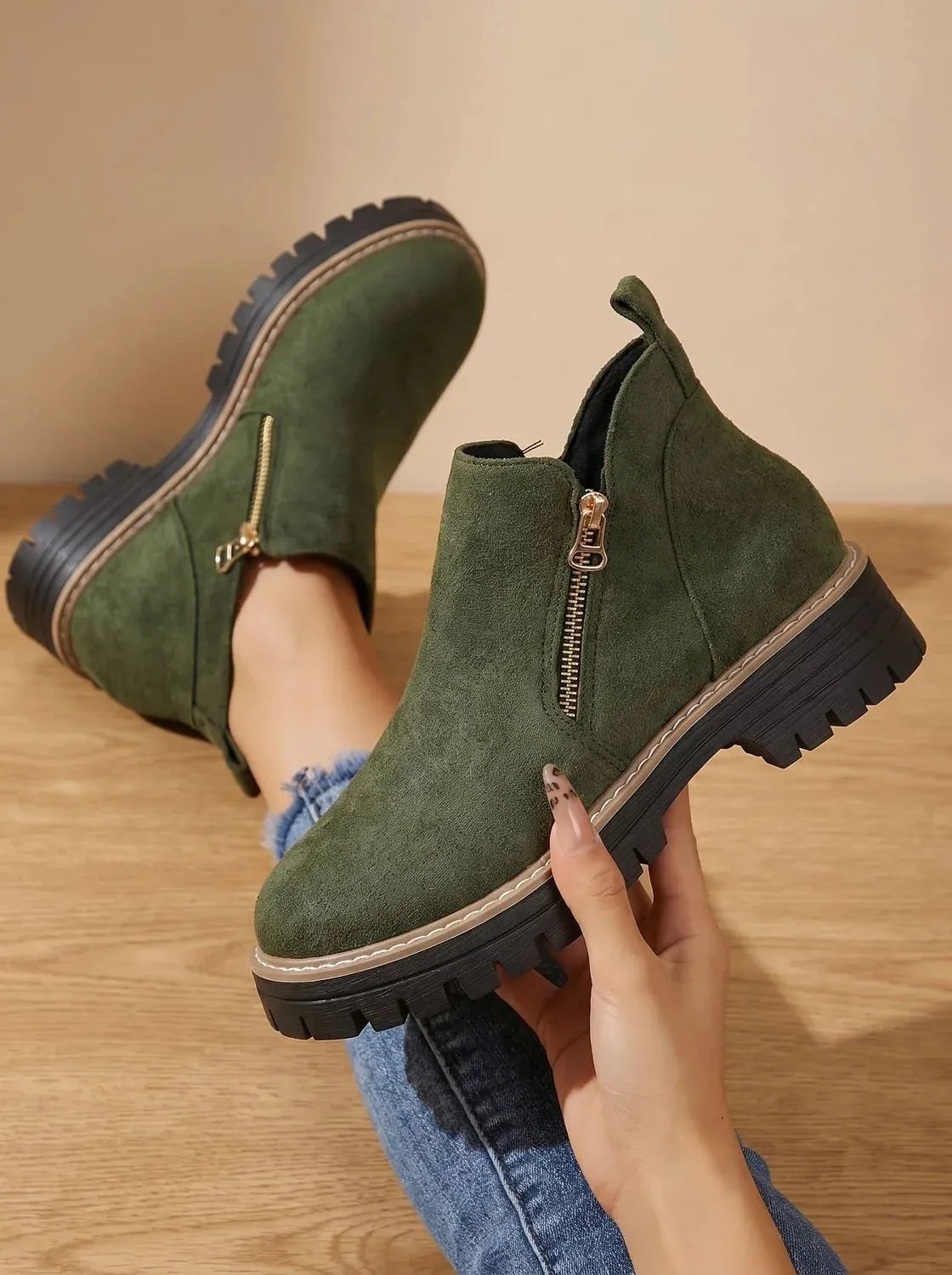 Women's Orthopedic Ankle Boots with Side Zipper & Non-Slip Tread - Hand Held Sole View