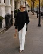 Black Women's Oversized Asymmetric Sweater with Side Slit Hem & Long Sleeves