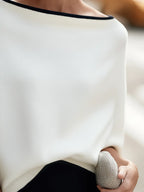 White Women's Oversized Knit Sweater with Boat Neck & Dolman Sleeves - Hem Detail