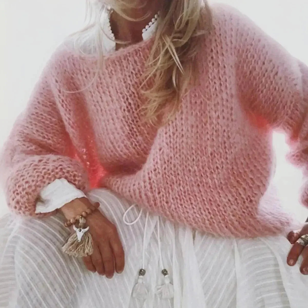 Light Pink Women's Oversized Knit Sweater with Relaxed Drop-Shoulder Fit — Coraline - Close Up Seated