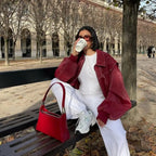Burgundy Women's Oversized Quilted Bomber Jacket with Contrast Stitching & Relaxed Fit — Chloe - Bench Coffee Pose
