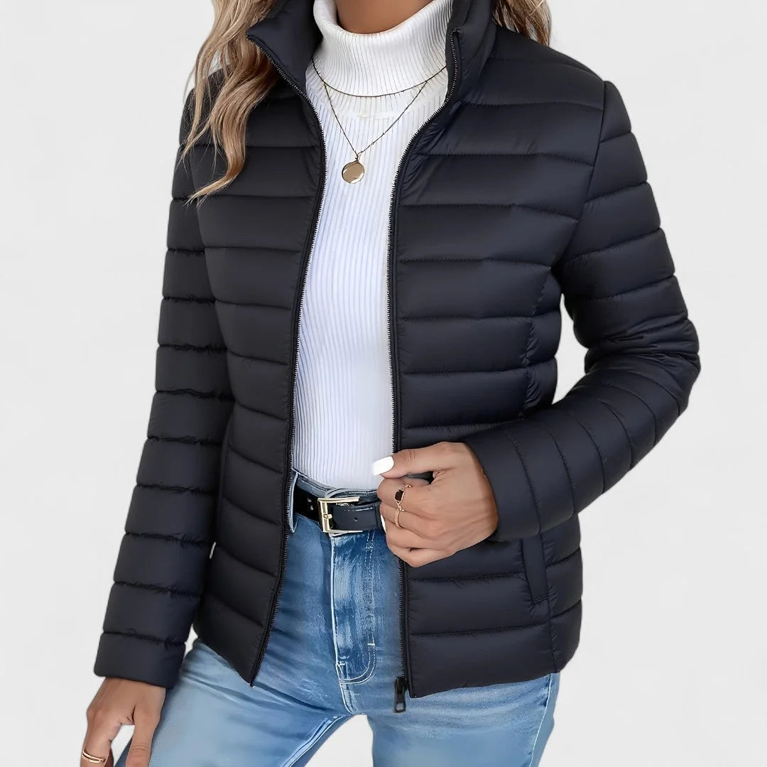 Black Women's Quilted Jacket with Stand Collar & Zip Pockets — Lola - Front Close Hand Pose