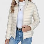 White Women's Quilted Jacket with Stand Collar & Zip Pockets — Lola - Front Close Studio