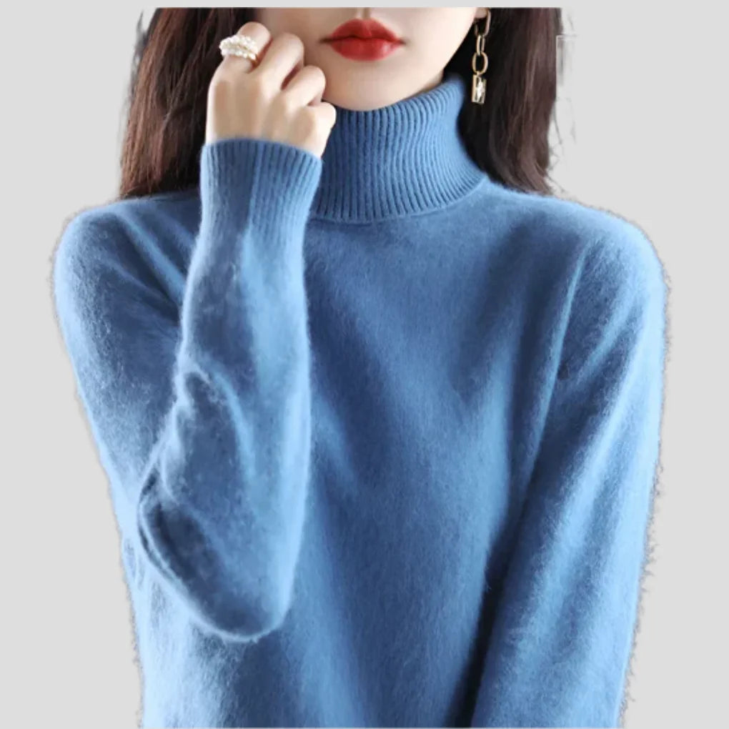 Mist Blue Women's Ribbed Turtleneck Sweater with Fitted Silhouette & Long Sleeves - Hand At Chin Close
