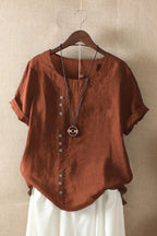 Orange Women's Round Neck Button Short Sleeve Blouse in Linen — Gigi - Front Hanging